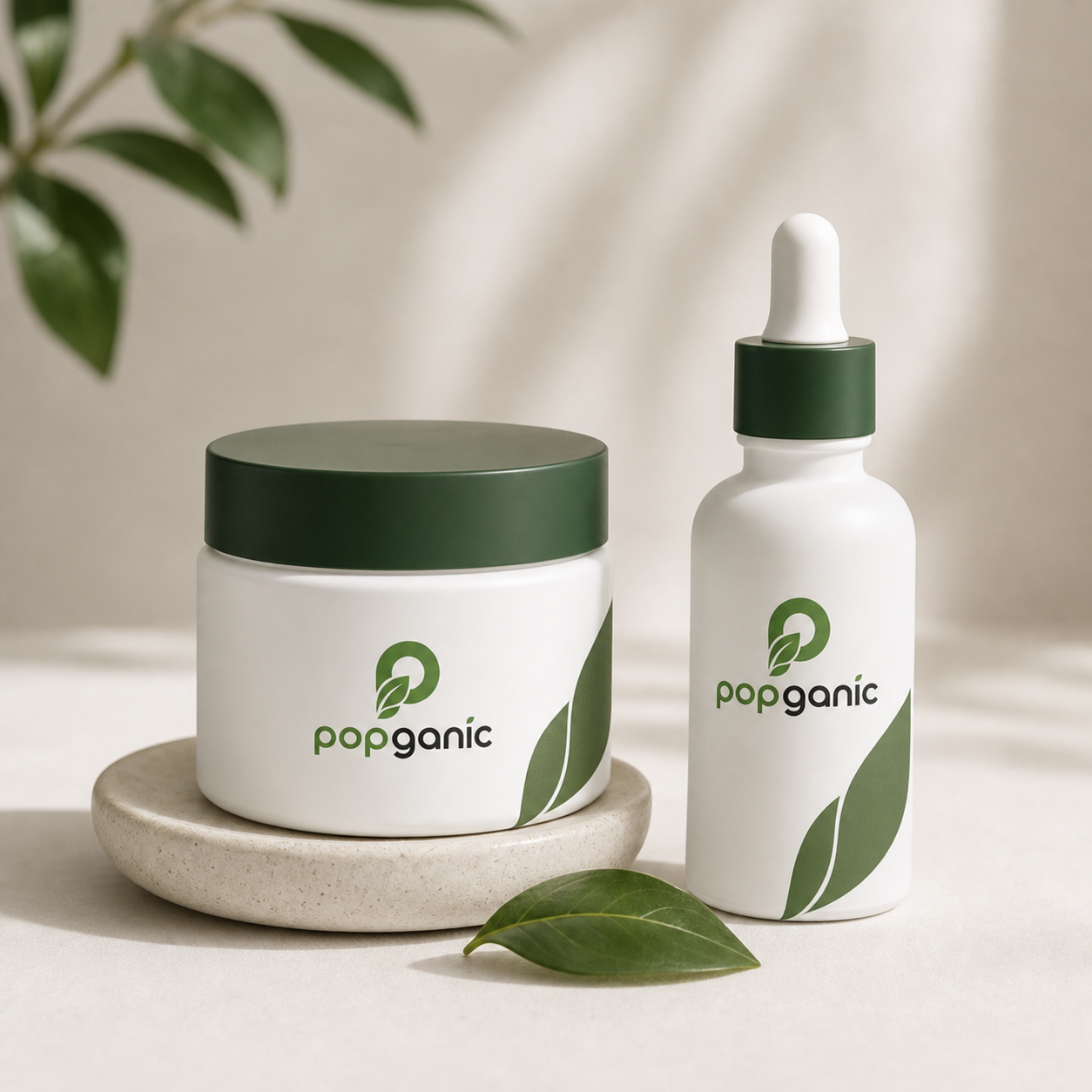 Popganic branded skin care jar and serum bottle